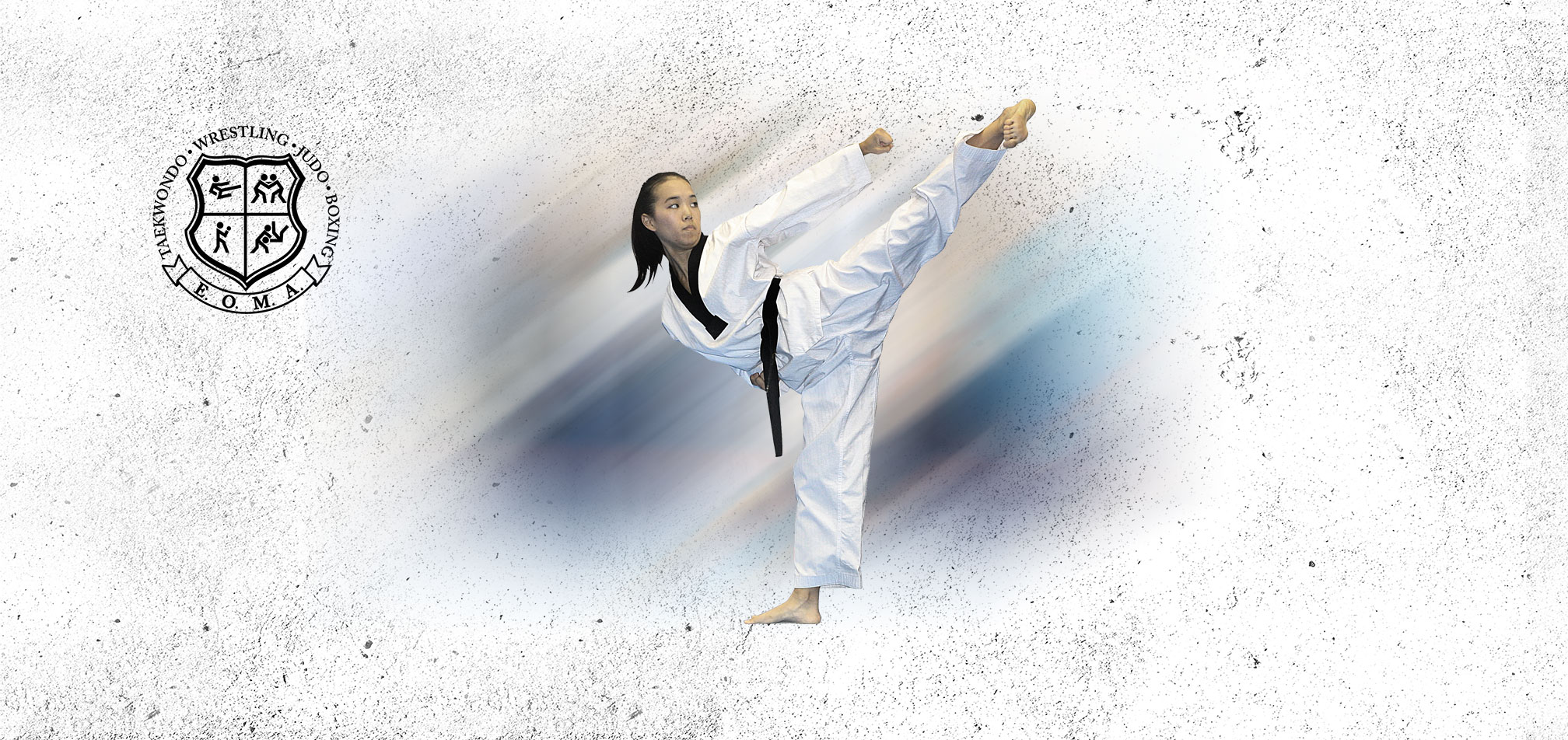 Teen girl doing taekwondo kick